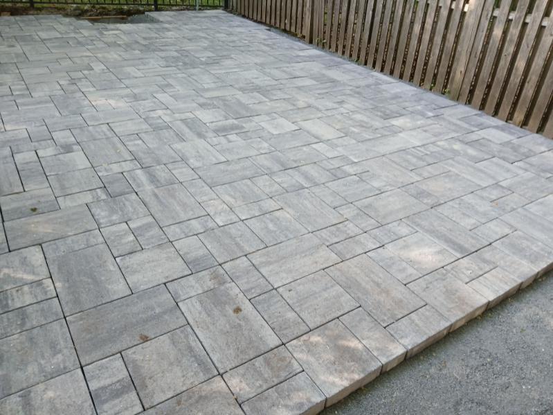 Completed light-gray paver patio